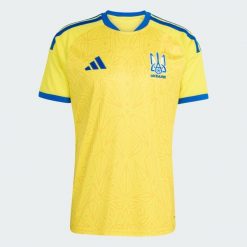 Koszulka podstawowa Ukraina 26. Żółte t-shirty sportowe męskie Adidas, m, z materiału, bez ramiączek, do piłki nożnej, climacool (adidas). Za 439.00 zł.