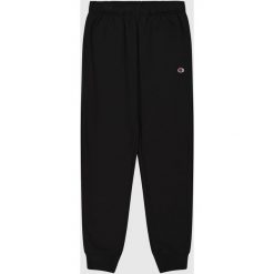 Spodnie Champion Z Mankietami Ściągaczowymi Dorośli. Czarne spodnie materiałowe męskie CHAMPION, bez wzorów. Za 138.99 zł.