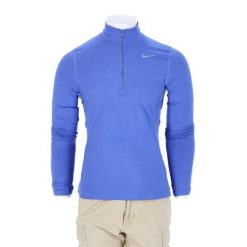 Second life - Męska niebieska bluza Dri-Fit - Jak nowy. Niebieskie bluzy bez kaptura męskie Nike, bez wzorów, sportowe, bez kołnierzyka, bez ramiączek. Za 106.46 zł.