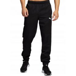 Męskie spodnie sportowe dresowe treningowe czarne PUMA ACTIVE WOVEN 586733-01. Czarne spodnie sportowe męskie Puma, z dresówki. Za 74.90 zł.