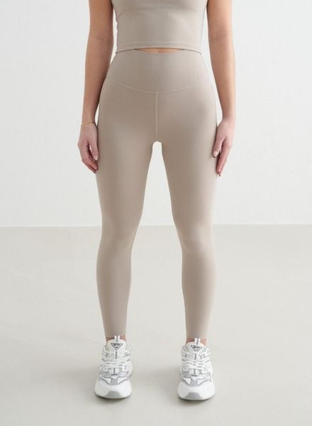 Damskie legginsy z wysokim stanem, squat proof, dla niskich Sense ciemny beż. Brązowe legginsy damskie Aim'n, s, bez wzorów, z elastanu. Za 297.00 zł.