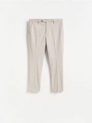 Eleganckie spodnie slim fit w kratę - brązowy. Brązowe spodnie materiałowe męskie Reserved, bez wzorów, z tkaniny, eleganckie. Za 169.99 zł.