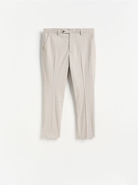 Eleganckie spodnie slim fit w kratę - brązowy. Brązowe spodnie materiałowe męskie Reserved, z tkaniny. Za 169.99 zł.