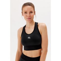 Stanik sportowy biegowy Rough Radical Sports Bra Icon Run. Białe biustonosze sportowe damskie ROUGH RADICAL, bez wzorów. Za 129.90 zł.