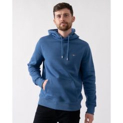 Bluza z kapturem Gant Shield. Niebieskie bluzy z kapturem męskie Gant, l, z bawełny. Za 495.45 zł.