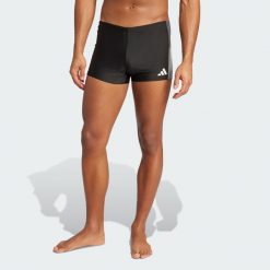 Bokserki do pływania z kontrastowym zestawieniem kolorów. Niebieskie bokserki męskie Adidas, bez wzorów. Za 129.00 zł.