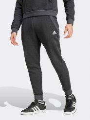 Adidas Spodnie dresowe w kolorze czarnym rozmiar: XXL. Czarne spodnie dresowe męskie Adidas, bez wzorów, z dresówki. Za 131.74 zł.
