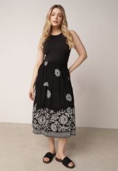 Czarna Rozkloszowana Spódnica z Wiskozy w Kwiatowy Wzór Masterore. Czarne spódniczki damskie Born2be, uniwersalny, bez wzorów, z jeansu, biznesowe, midi, dopasowane. Za 59.99 zł.