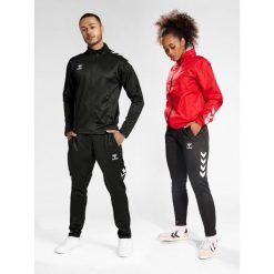 Spodnie dresowe piłkarskie męskie Hummel Core XK Training Poly Pants. Czarne spodnie dresowe męskie HUMMEL, bez wzorów, z dresówki. Za 134.00 zł.
