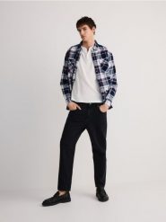 Jeansy carrot fit - czarny. Czarne jeansy męskie Reserved. W wyprzedaży za 109.99 zł.