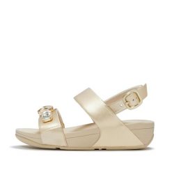 Damskie sandały na koturnie FitFlop Lulu Ultra-Jewel Metallic. Szare sandały damskie FIT FLOP, bez wzorów, z materiału, bez obcasa, na koturnie. Za 715.50 zł.