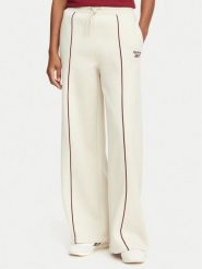 Reebok Spodnie dresowe Oliwia RK25683CCW Beżowy Regular Fit. Brązowe spodnie dresowe damskie Reebok, s, bez wzorów, z bawełny. Za 199.99 zł.