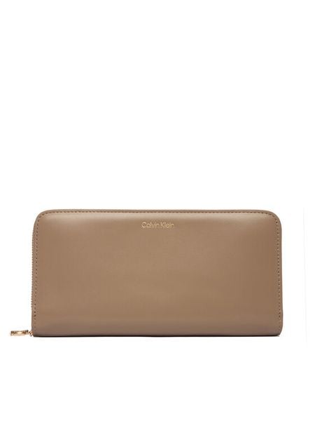 Calvin Klein Portfel Ck Large Zip Around LV04F1093G Beżowy. Brązowe portfele damskie CALVIN KLEIN, bez wzorów, ze skóry. Za 265.99 zł.