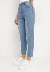 Niebieskie Klasyczne Jeansy o Kroju Mom Fit Natisti. Niebieskie jeansy damskie Born2be. Za 39.99 zł.
