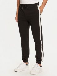 Tommy Hilfiger Spodnie dresowe UM0UM03013 Czarny Regular Fit. Czarne spodnie dresowe męskie Tommy Hilfiger, bez wzorów, z bawełny. Za 299.99 zł.