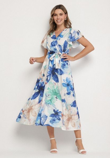 Niebieska Sukienka w Kwiaty o Kopertowym Kroju z Wiązanym Paskiem Redanae. Niebieskie sukienki damskie Born2be, na co dzień, l, bez wzorów, eleganckie, bez kołnierzyka, bez ramiączek, maxi, kopertowe. Za 99.99 zł.