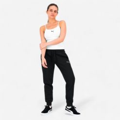 Spodnie dresowe damskie Puma Gym & Pilates. Czarne spodnie sportowe damskie Puma, l, z bawełny, na fitness i siłownię. Za 79.99 zł.