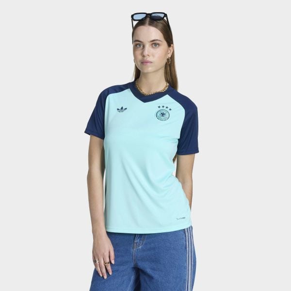 Wyjazdowa koszulka przedmeczowa Niemcy 26. Niebieskie bluzki damskie Adidas, l, z materiału, bez kołnierzyka, bez ramiączek. Za 299.00 zł.