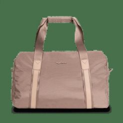 WINGS Torba sportowo - podróżna SKYLARK beige. Brązowe torebki klasyczne damskie Wings, w ażurowe wzory, z materiału, duże, bez dodatków. Za 129.90 zł.