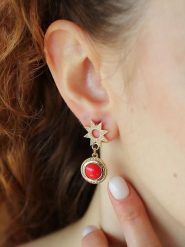 Pierres delicates Pozłacane kolczyki-wkrętki z cyrkoniami rozmiar: onesize. Pomarańczowe kolczyki damskie Pierres delicates, z cyrkonią, pozłacane. Za 43.99 zł.