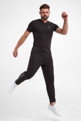 Spodnie dresowe ARMANI EXCHANGE. Spodnie dresowe męskie Armani Exchange, bez wzorów, z dresówki. W wyprzedaży za 345.87 zł.