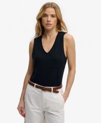 Superdry Top bez rękawów z dekoltem V w dżerseju, fason relaxed – ECLIPSE NAVY. Niebieskie topy sportowe damskie Superdry., uniwersalny, bez wzorów, z bawełny, bez ramiączek. Za 107.80 zł.