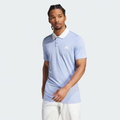 Koszulka Tennis FreeLift Polo. Niebieskie koszulki polo męskie Adidas, l, bez wzorów, z materiału, bez ramiączek. Za 265.00 zł.