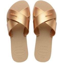 Klapki Havaianas Model 4148866h Kolor Brąz. Brązowe klapki damskie Havaianas, bez wzorów, z gumy, bez obcasa. Za 83.99 zł.