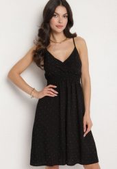 Czarna Wiskozowa Sukienka z Kopertowym Dekoltem Arileme. Czarne sukienki damskie Born2be, l, bez wzorów, z wiskozy, eleganckie, bez kołnierzyka, bez ramiączek, mini, kopertowe. Za 59.99 zł.