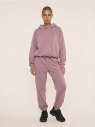 Spodnie wide leg comfort z dzianiny fleece Active - różowy. Czerwone spodnie sportowe damskie Sinsay, l, z dzianiny, na fitness i siłownię. Za 49.99 zł.
