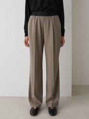 OPUS Spodnie w kolorze karmelowo-czarnym rozmiar: 40. Brązowe spodnie materiałowe damskie Opus, bez wzorów, z materiału, z podwyższonym stanem. Za 158.84 zł.