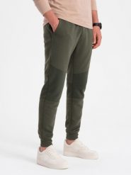 Męskie spodnie dresowe ze wstawkami z tkaniny ottoman - ciemnooliwkowe V3. Zielone spodnie dresowe męskie Ombre Clothing, bez wzorów, z bawełny. W wyprzedaży za 39.99 zł.
