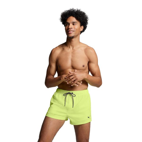 Męskie kąpielówki Puma, krótkie, Fast Yellow. Żółte kąpielówki męskie Puma, m, bez wzorów, na fitness i siłownię. Za 173.99 zł.