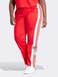 Adidas Spodnie sportowe w kolorze czerwonym rozmiar: 1X. Czerwone spodnie dresowe damskie Adidas, outdoorowe. Za 162.49 zł.