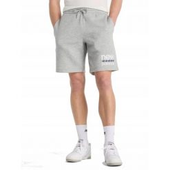 SPODENKI SZORTY męskie NEW BALANCE MS51940AG dresowe sportowe szare XL. Szare szorty męskie New Balance, bez wzorów, z dresówki, sportowe. Za 169.00 zł.