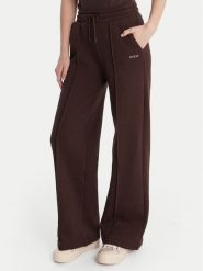 Guess Spodnie dresowe V6RB17 K9V31 Brązowy Regular Fit. Brązowe spodnie dresowe damskie Guess, m, z aplikacjami, z bawełny. Za 349.99 zł.