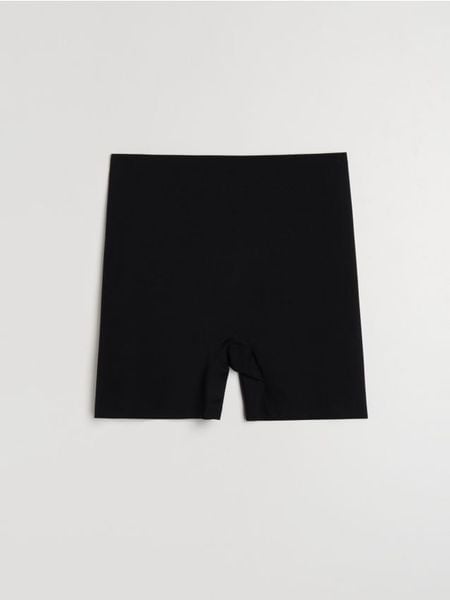 Szorty modelujące z silikonową taśmą na nogawkach - czarny. Czarne szorty damskie Sinsay, bez wzorów. Za 25.99 zł.