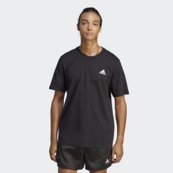 Koszulka sportowa męska adidas Essentials. Czarne t-shirty sportowe męskie Adidas, m, z bawełny, bez ramiączek, do piłki nożnej. Za 124.00 zł.