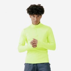 Bluza do biegania męska Kalenji Run 100 Warm Visibilite. Żółte bluzy bez kaptura męskie KALENJI, m, z bawełny. Za 59.99 zł.