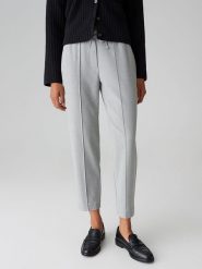 OPUS Spodnie w kolorze szarym rozmiar: 42. Szare spodnie materiałowe damskie Opus, bez wzorów, z materiału. Za 222.41 zł.