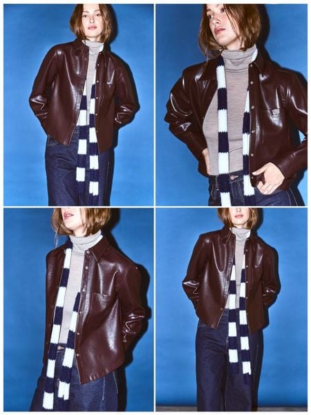 Koszula z imitacji skóry - ciemnobrązowy. Brązowe koszule damskie Reserved, l, bez wzorów, ze skóry, bez kołnierzyka, bez ramiączek. Za 139.99 zł.