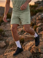 Szorty z bawełną SNSY PERFORMANCE - zielony. Zielone szorty męskie Sinsay, bez wzorów, z bawełny. Za 39.99 zł.