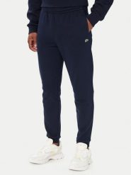 Lacoste Spodnie dresowe XH9833 Granatowy Regular Fit. Niebieskie spodnie dresowe męskie Lacoste, bez wzorów, z bawełny. Za 549.99 zł.