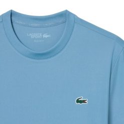 T-shirt Lacoste Core Performance Th. Niebieskie t-shirty damskie Lacoste, l, bez wzorów, z jersey, bez kołnierzyka. Za 310.00 zł.