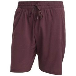 Spodenki Adidas Ergo Męskie 7 Calowe. Czerwone szorty męskie Adidas, bez wzorów, z materiału, sportowe. Za 233.15 zł.