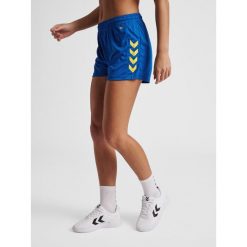 Damskie Szorty z poliestru Hummel Core XK. Niebieskie spodenki sportowe damskie HUMMEL, bez wzorów, sportowe. Za 110.00 zł.
