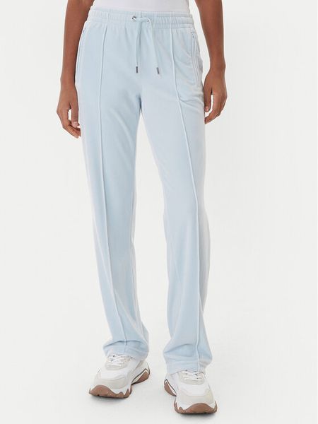 Juicy Couture Spodnie dresowe Tina JCWBJ225307 Błękitny Regular Fit. Niebieskie spodnie dresowe damskie Juicy Couture, xs, bez wzorów, z dresówki. Za 279.99 zł.