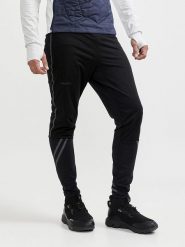 Craft Spodnie "ADV SubZ Lumen Wind" w kolorze czarnym do biegania rozmiar: XL. Czarne spodnie materiałowe męskie Craft, bez wzorów. Za 184.46 zł.