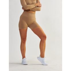 Szorty fitness damskie Beshaped Power Up! Modelujące. Brązowe spodenki sportowe damskie BESHAPED, bez wzorów, z nylonu, sportowe. W wyprzedaży za 135.15 zł.