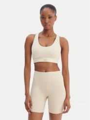 Reebok Biustonosz sportowy Reebok x Ewa Chodakowska Ela RK25615CCW Beżowy. Brązowe biustonosze sportowe damskie Reebok, bez wzorów, z syntetyku. Za 179.99 zł.